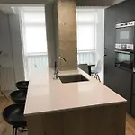 Acogedor En *