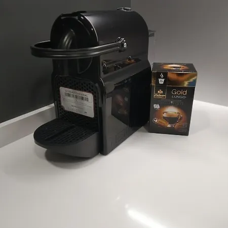 Acogedor En * סומאיה