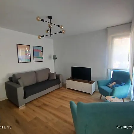 Acogedor En * סומאיה